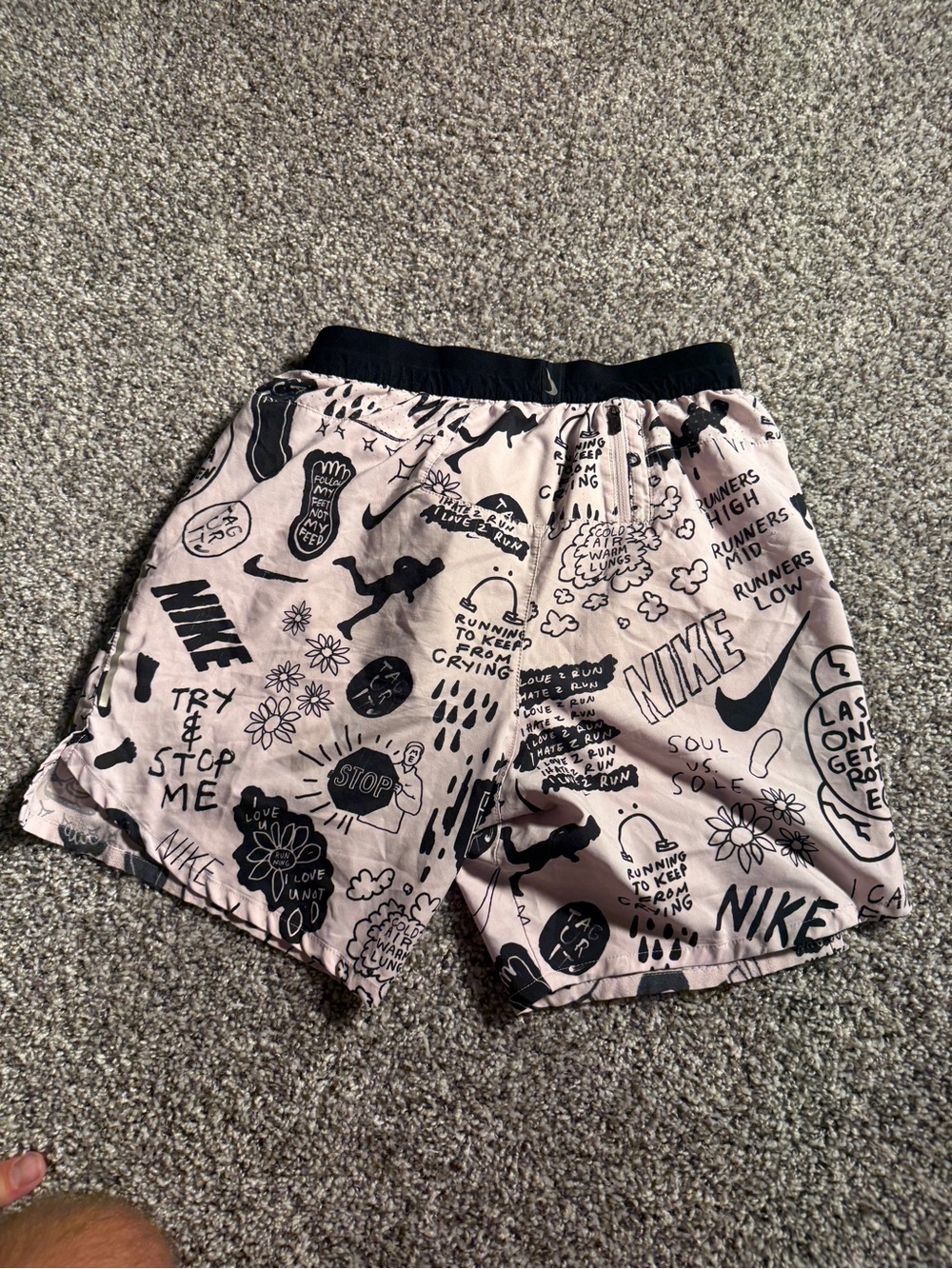Nike Light Pink Graphic Running Shorts with Black Accents